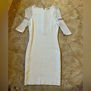 White knit dress. Very sexy on. Good condition. Zips up the back.